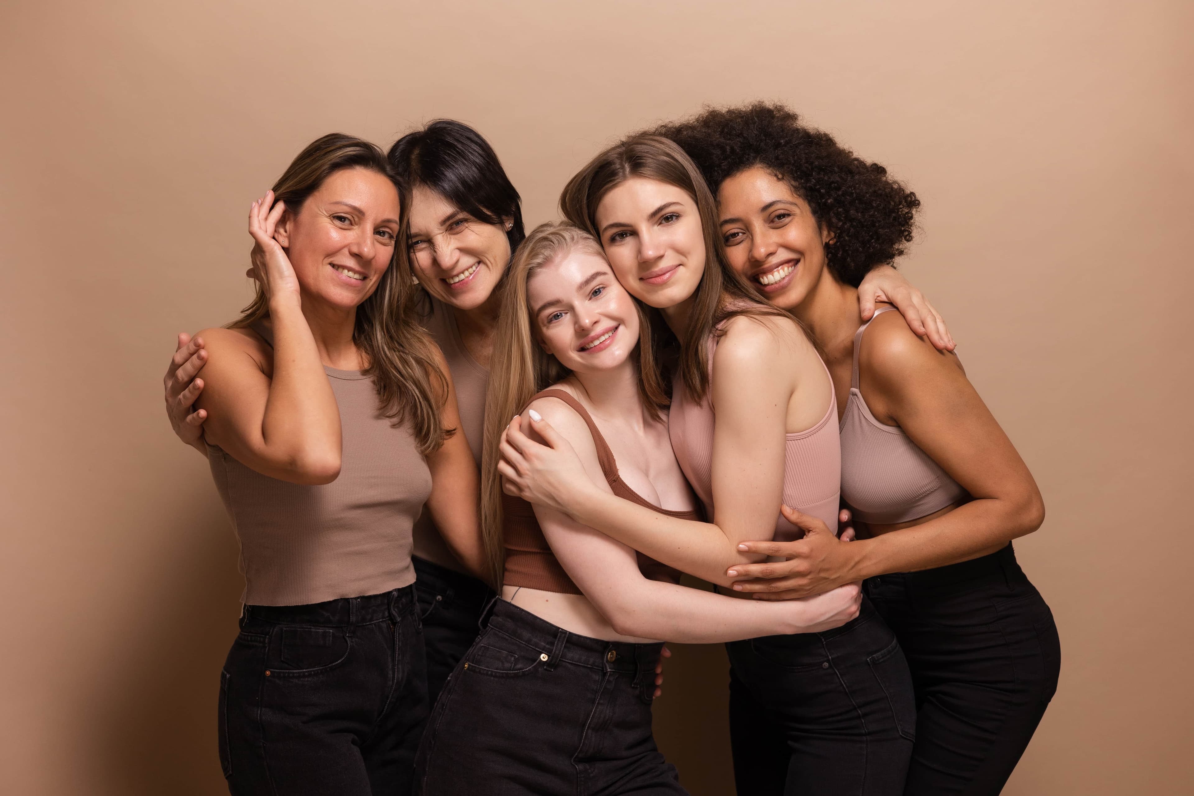 A blurred image of a group of women smiling